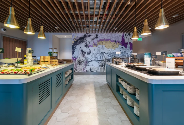 Buffet counter and hot food inside Aspire Lounge at Edinburgh Airport
