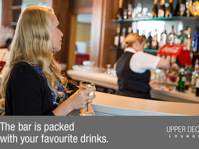 Runway-facing seating in the Upper Deck Lounge at Glasgow Airport