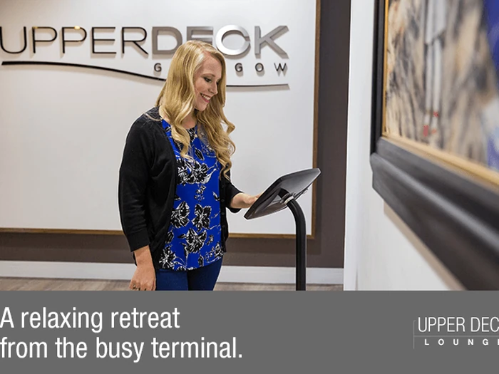 Seating area inside the Upper Deck Lounge at Glasgow Airport