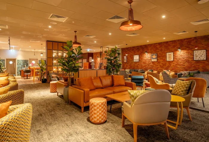Comfortable seating area inside My Lounge at Heathrow Terminal 3