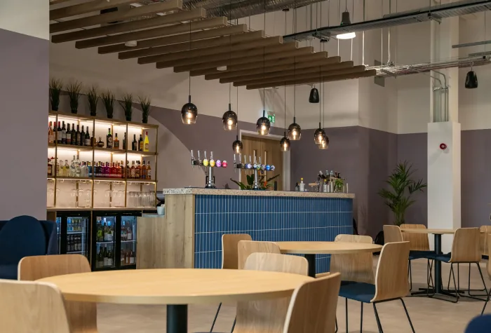 Bar and table seating inside the 681 lounge at Leeds Bradford Airport