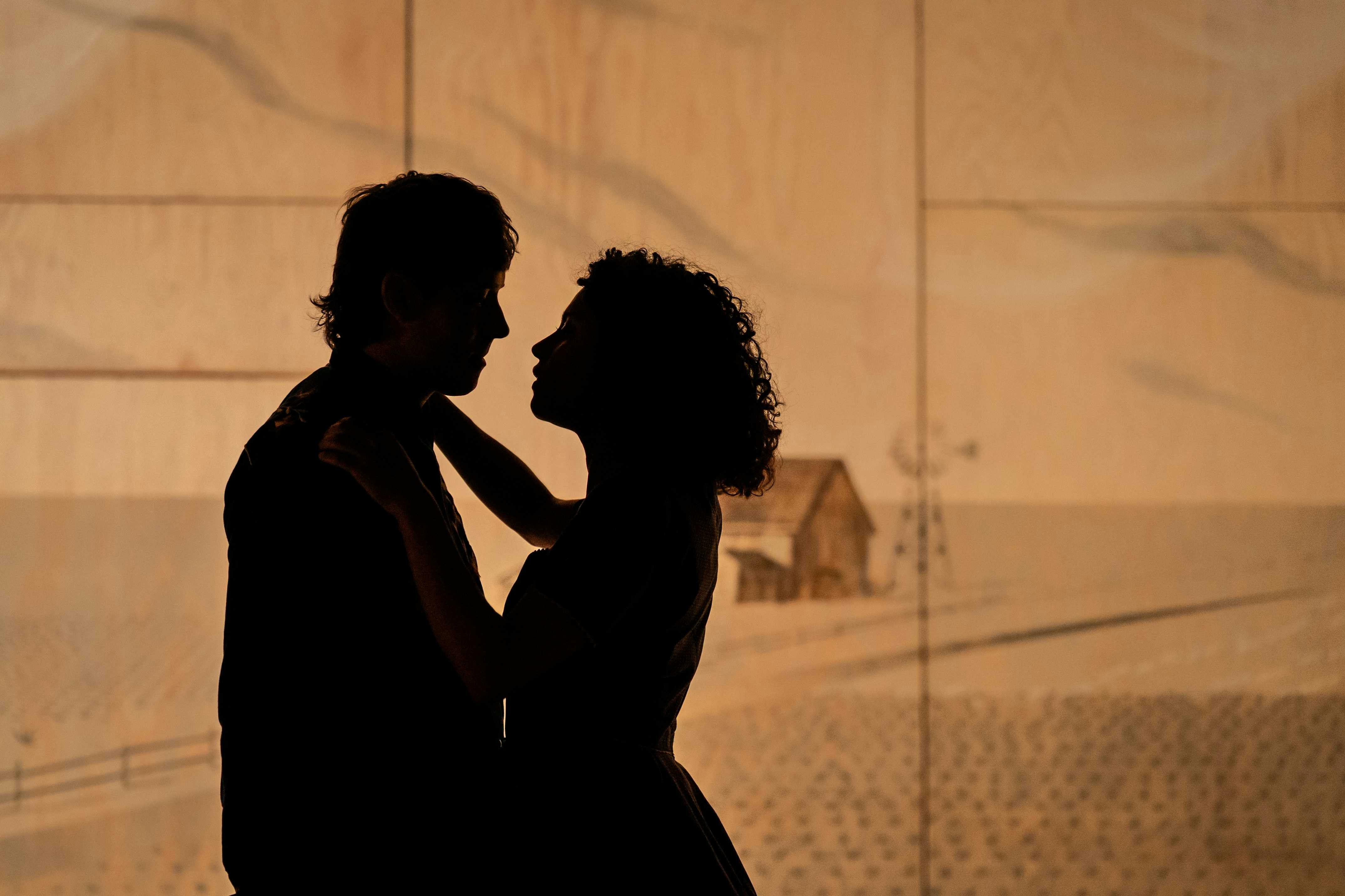 Oklahoma: The Musical - man and woman in silhouette