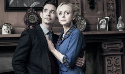 Vivid production stills from The Mousetrap Musical, showing a man in a suit gazing upwards and a woman in a blue dress leaning on his shoulder, both looking pensive against the backdrop of a vintage set.