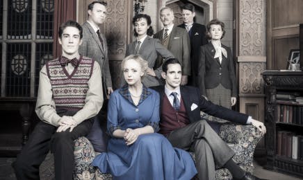 Vivid production stills from The Mousetrap Musical, showing the cast posing in character, with vintage costumes, in the intricately decorated drawing room set of the play.