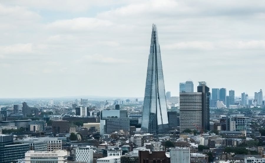 Panoramic view of The Shard in London, a towering landmark visible during sightseeing tours included in our exclusive ABBA Voyage hotel packages.