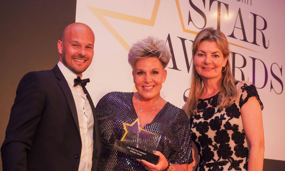 Holiday Extras winning the Star Holiday Add-ons Company award at the Travel Bulletin Star Awards in 2022