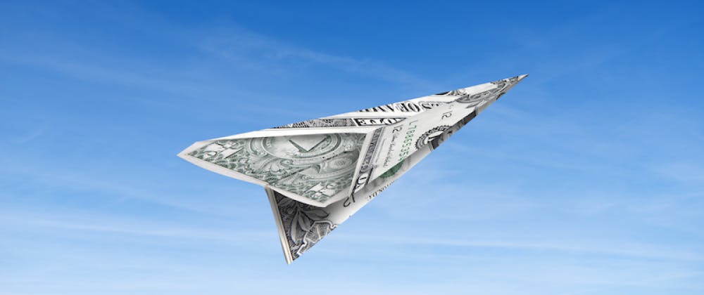 Paper plane made of cash