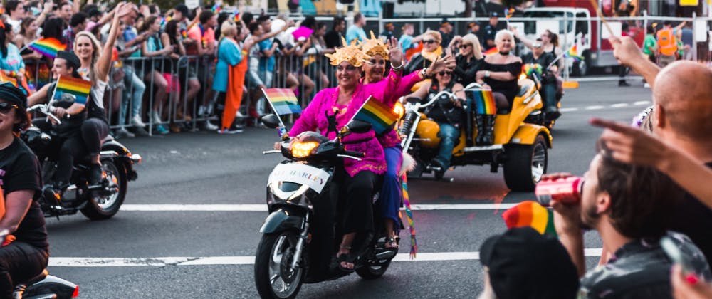 Motorcycles carrying Pride flags in parade at the Sydney Gay and Lesbian Mardi Gras