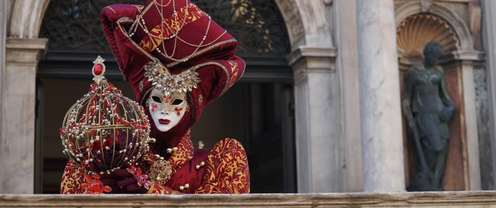 Person showing off their costume at the Carnival of Venice