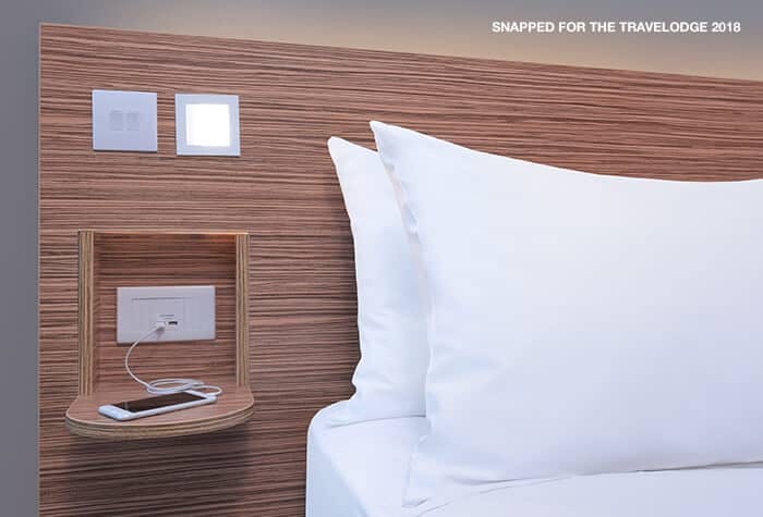 Pillows and USB chargers in a room at the Travelodge Gatwick Airport Central