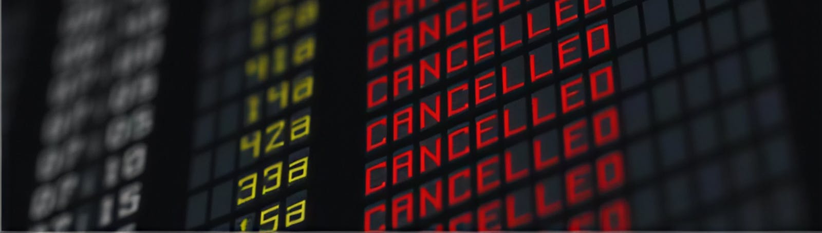 Airport departures board with the word 