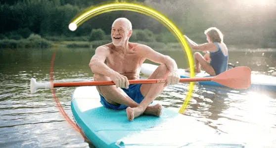 A couple canoeing while protected