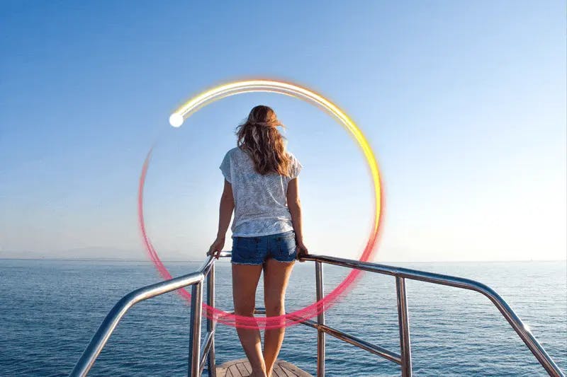 A woman on a cruise ship, protected