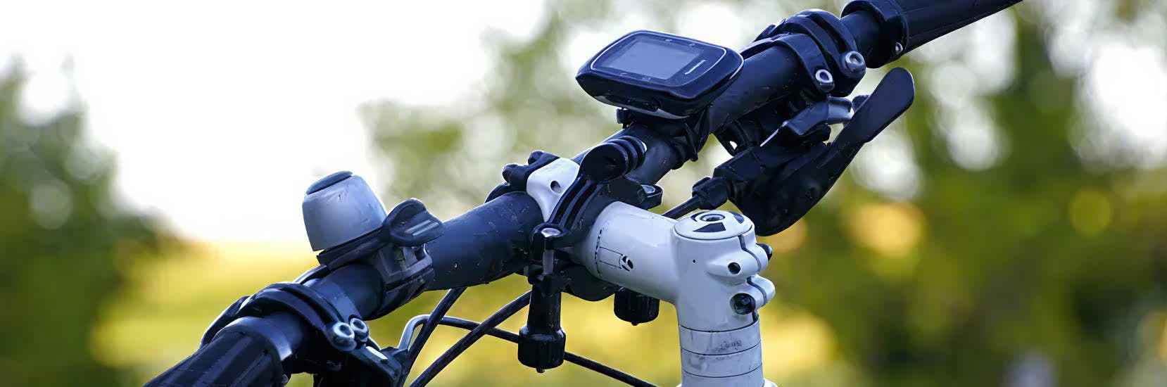 Happy older couple splashing in the sea on a sunny beach holiday, enjoying peace of mind with single travel insurance