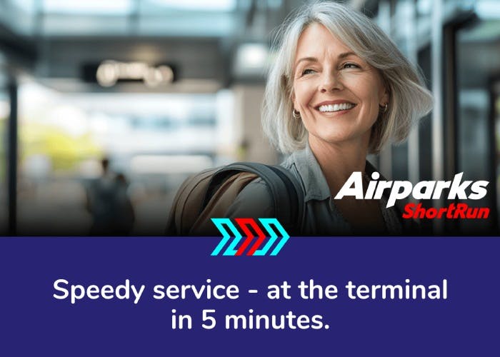 Smiling traveller parking at Birmingham Airport ShortRun car park - speedy service at the terminal in 5 minutes