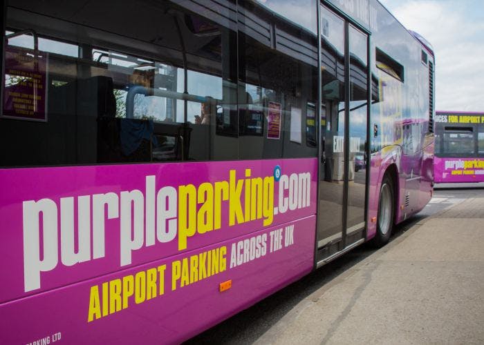 Purple Parking Gatwick Park & Ride shuttle bus ready for passenger transfer