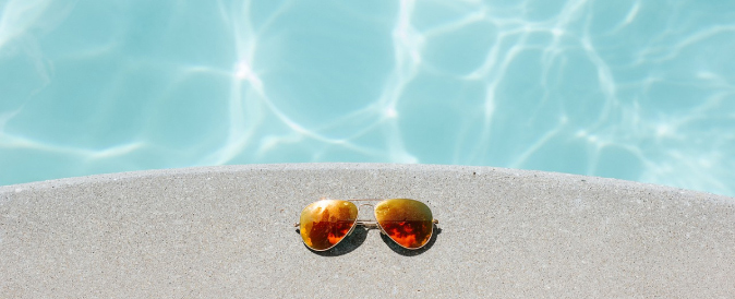 Sunglasses by the pool